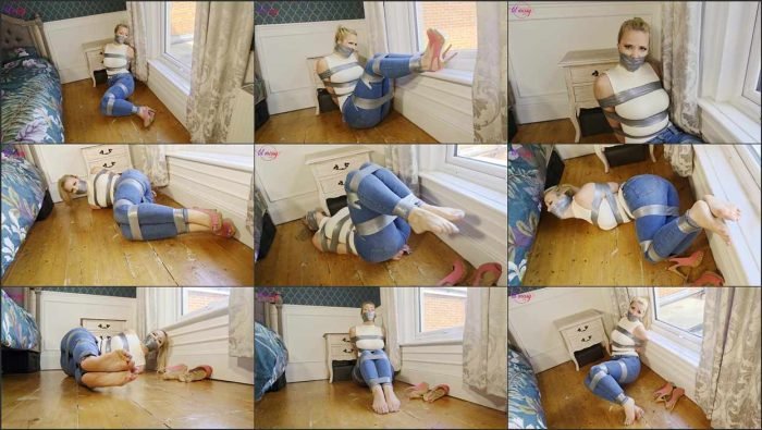 lmz Taped up damsel on the floor in jeans.mp4 700x395